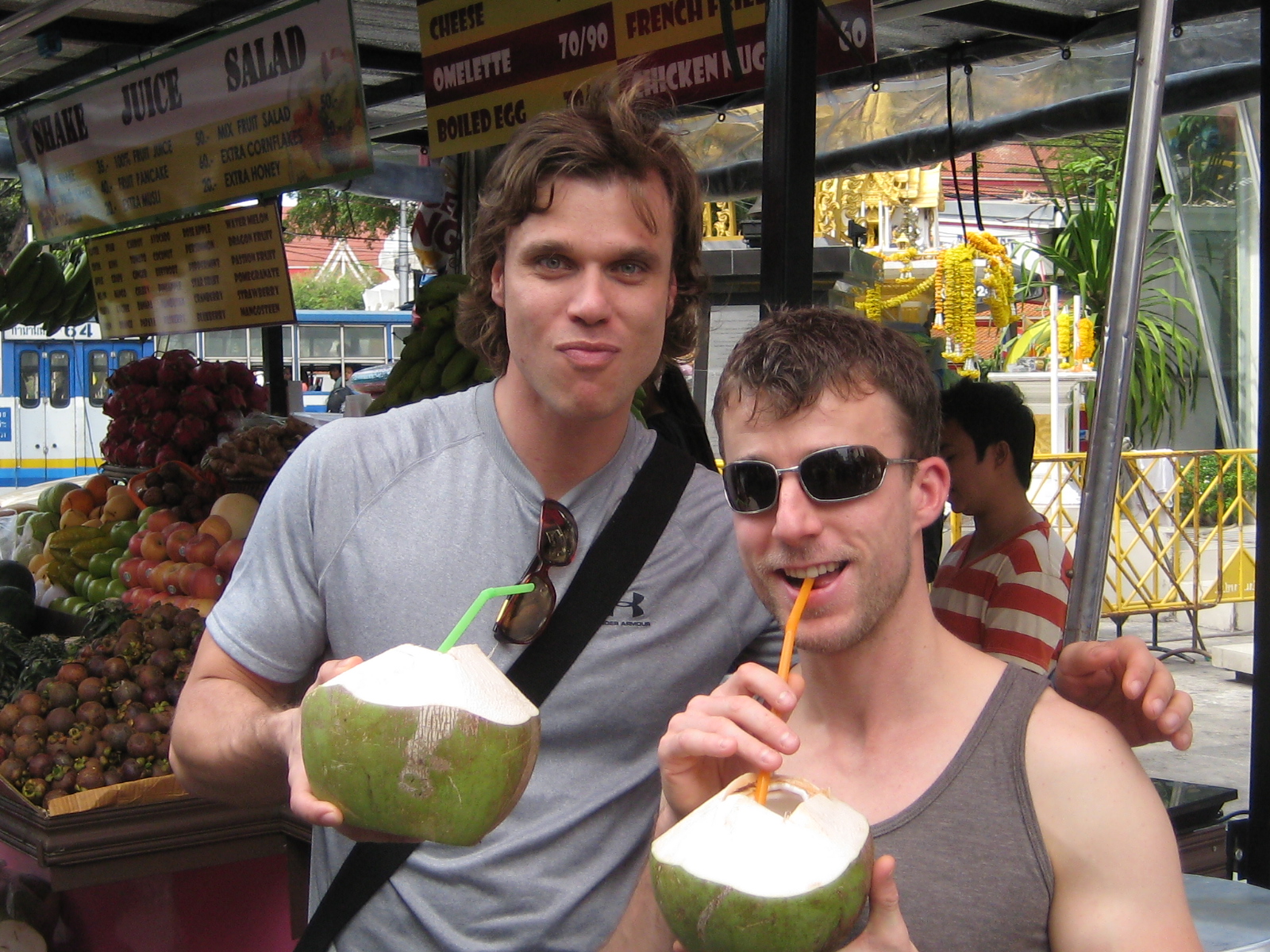 On Kao San Road: Jeroen and I enjoying the first coconut of the trip.