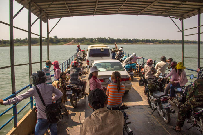 Taking the Mekong Ferry South of Kratie to the other side.