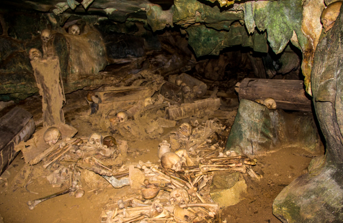 Skulls and bones in the cave. 