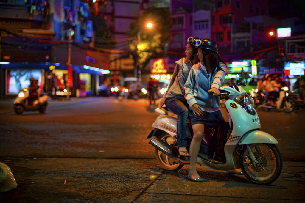 Vietnam Ladies on a scooter in Saigon, Vietnam